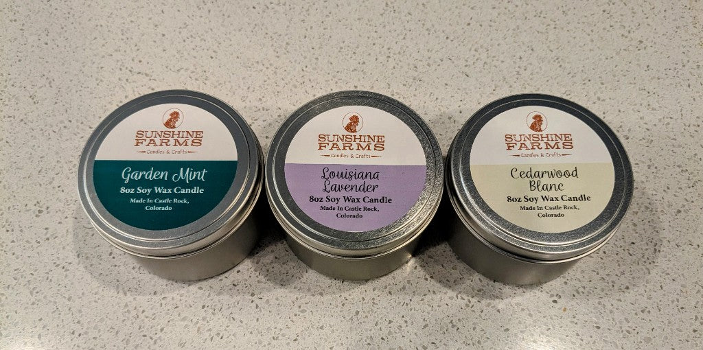 Garden mint, Louisiana lavender, and cedarwood blanc tin candles